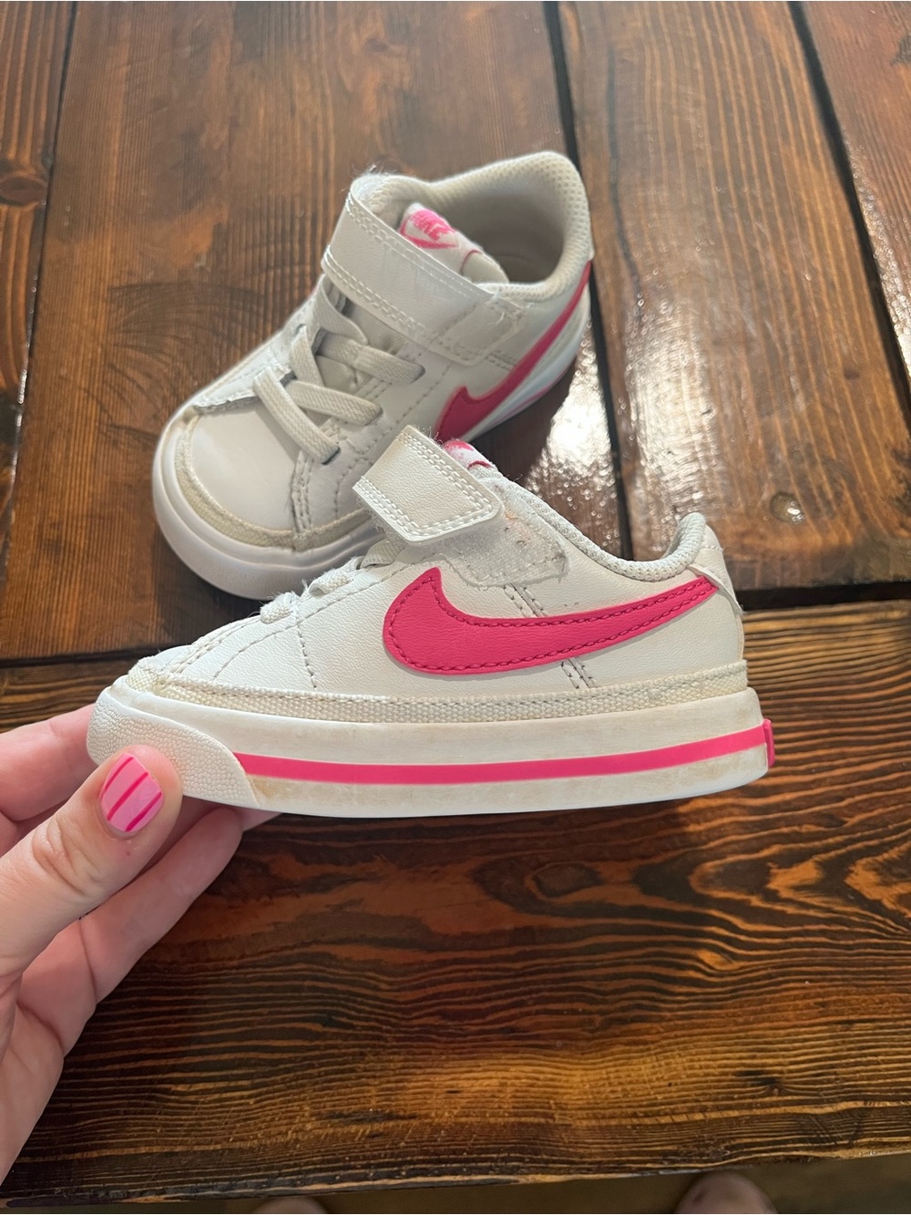 Nike Kids White Sneakers with Pink Swoosh and Pink Stripe